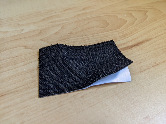 A piece of self-adhesive velcro